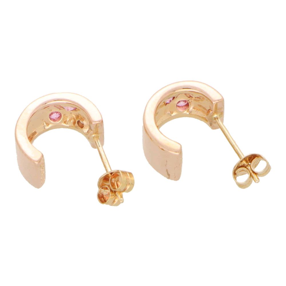 Vintage gold hoop earrings with pink sapphires.