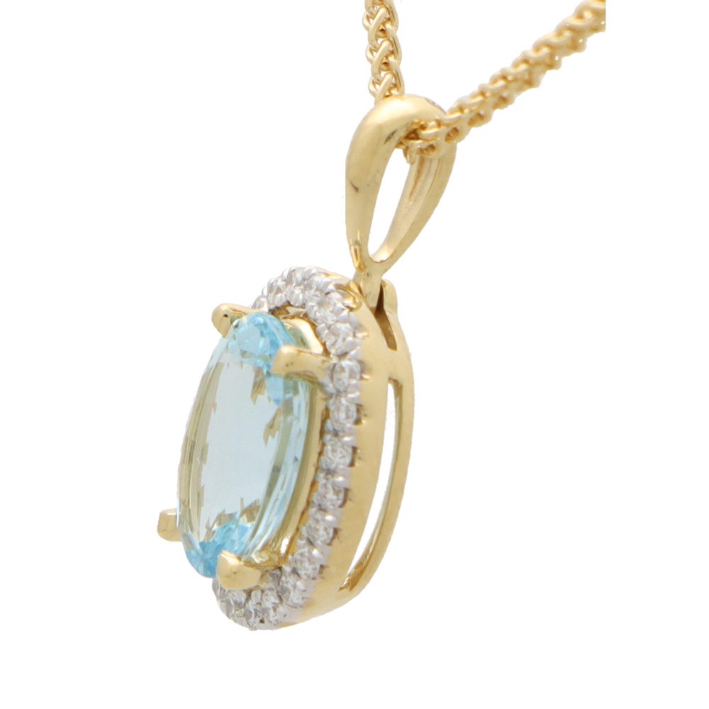 Oval Aquamarine and Diamond Halo Cluster Pendant in 18ct Yellow Gold, 1.12ct oval-cut sky blue aquamarine surrounded by 24 sparkling brilliant diamonds on polished gold bail