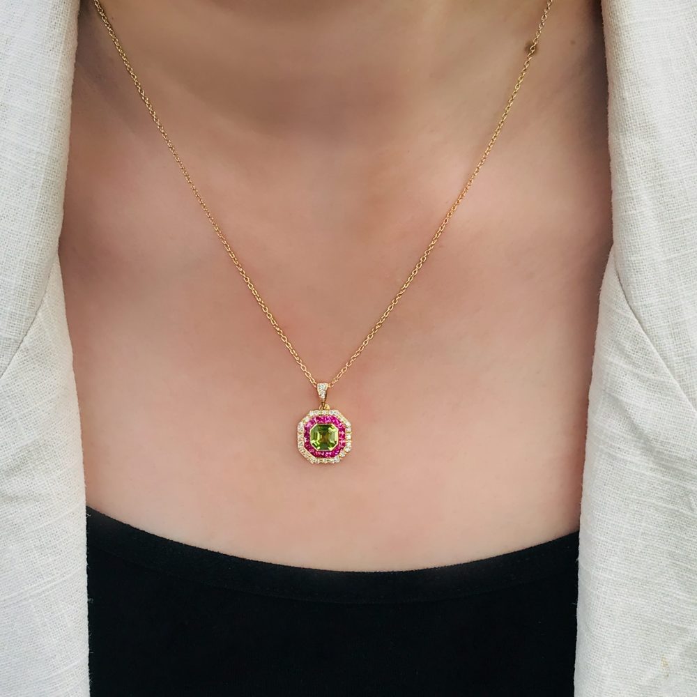Peridot Ruby and Diamond Octagonal Target Cluster Pendant in 18ct Yellow Gold, octagonal-shaped Asscher-cut green peridot surrounded by pinkish-red rubies with outer border of sparkling diamonds