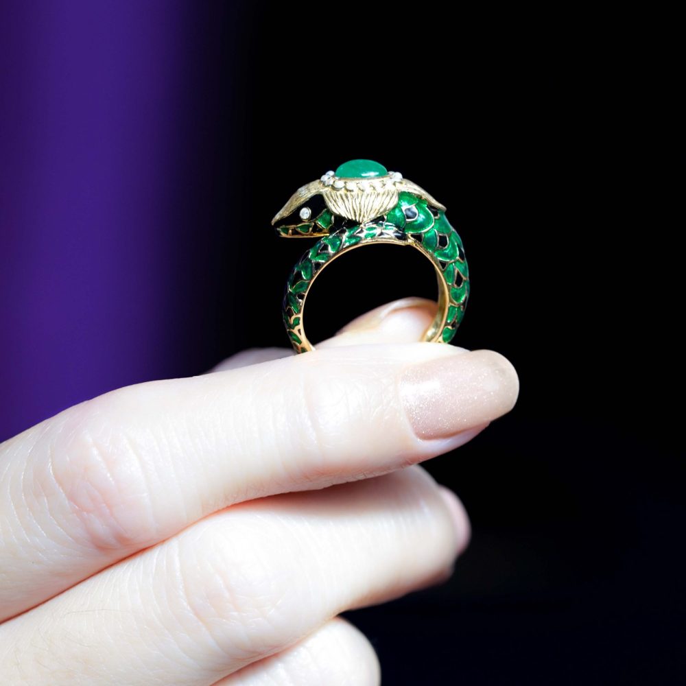 Green Black Enamel Snake Ring with Cabochon Emerald and Pearls, cabochon emerald surrounded by pearls with intricate enamel work and diamond eyes in 9ct yellow gold