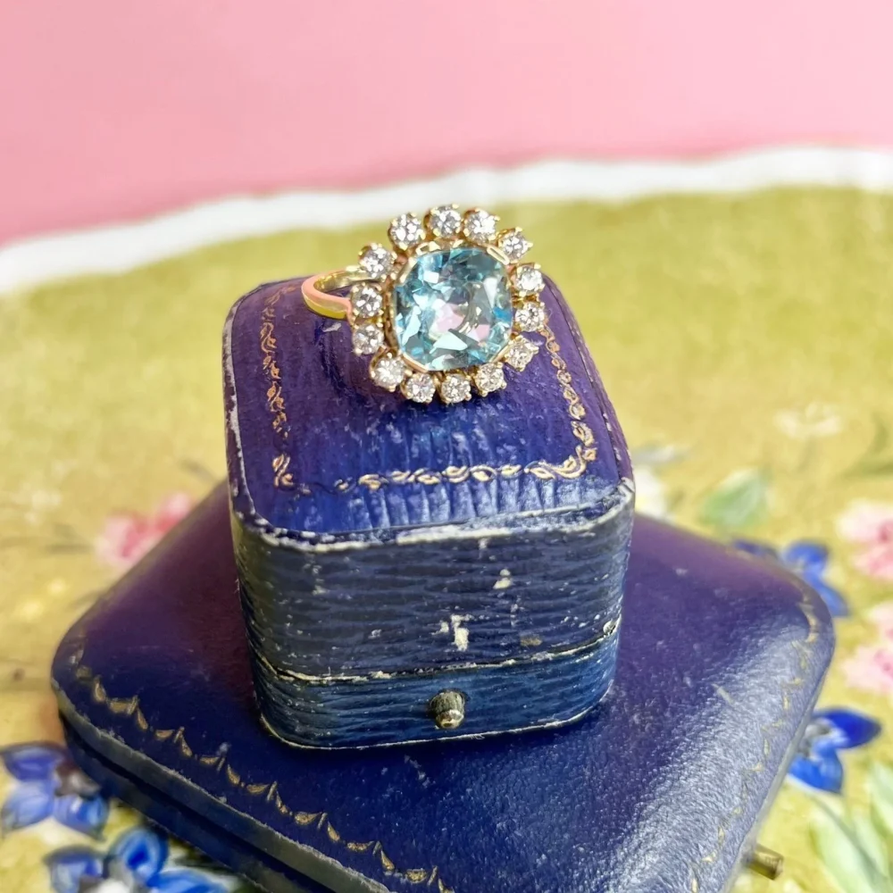 Vintage topaz and diamond ring in gold.