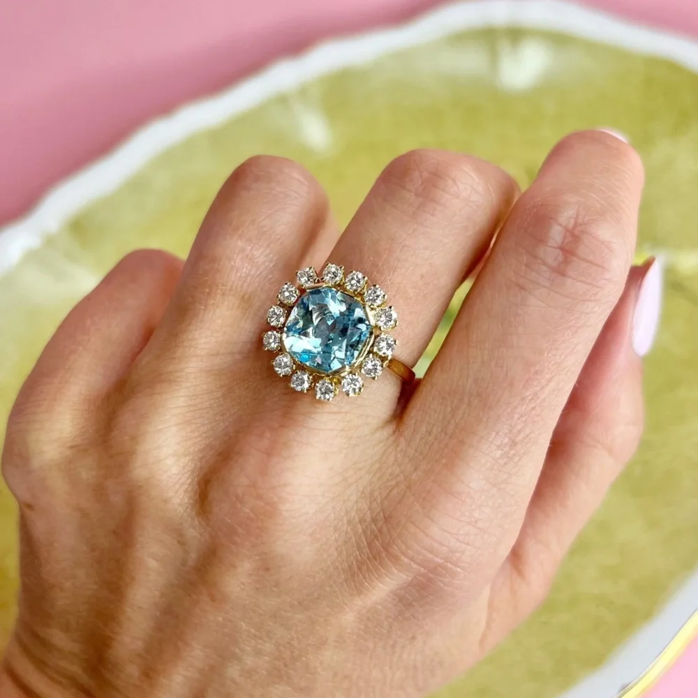 Vintage topaz and diamond ring in gold.