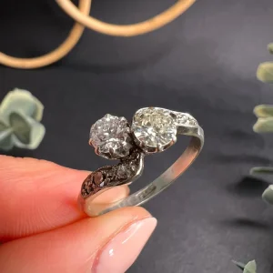 Antique diamond Toi et Moi engagement ring in platinum.