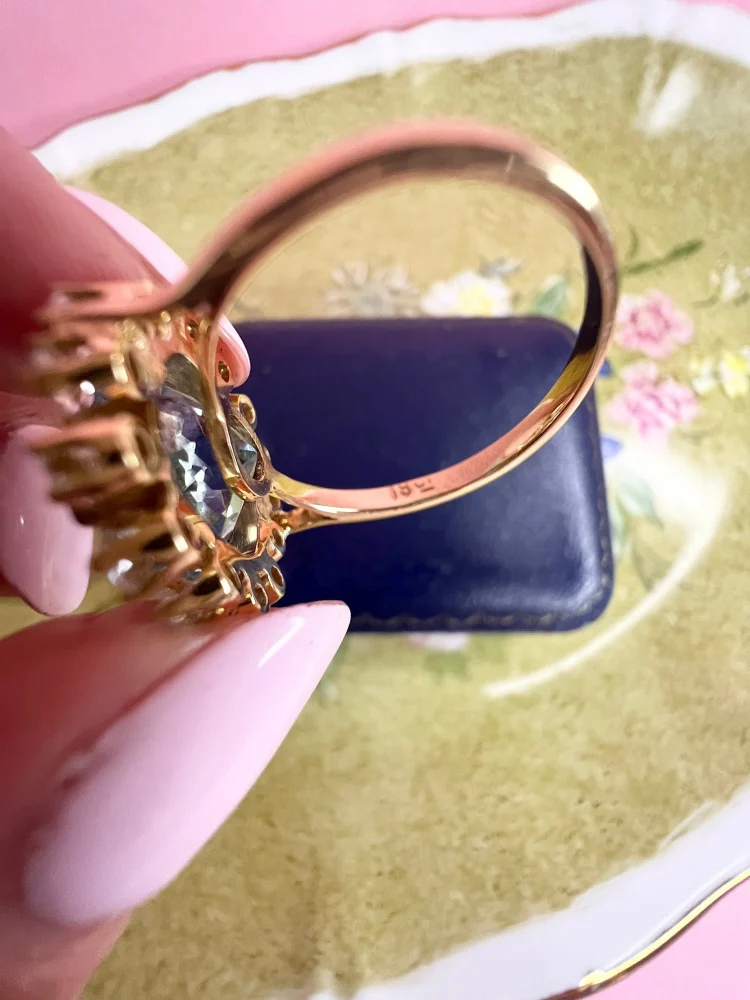 Vintage topaz and diamond ring in gold.