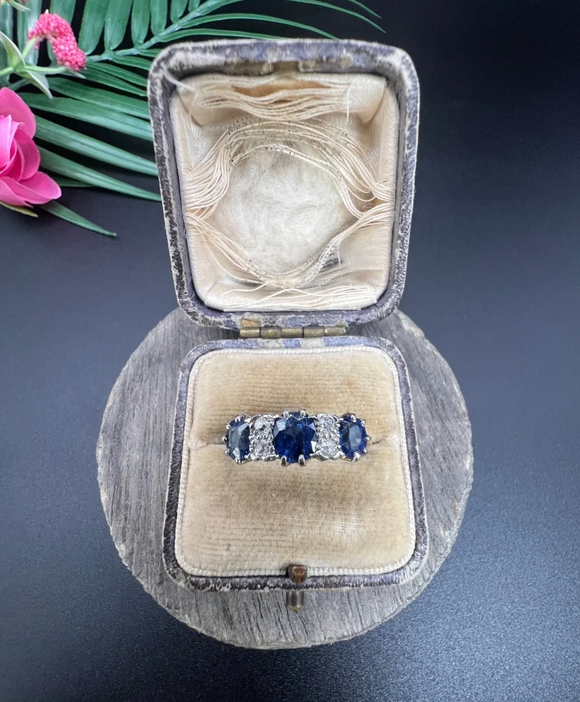 Antique sapphire and diamond ring in gold and platinum..