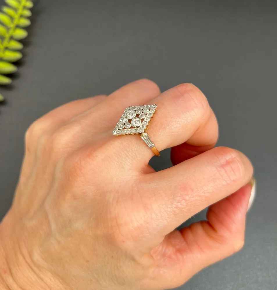Antique diamond ring in gold and platinum.