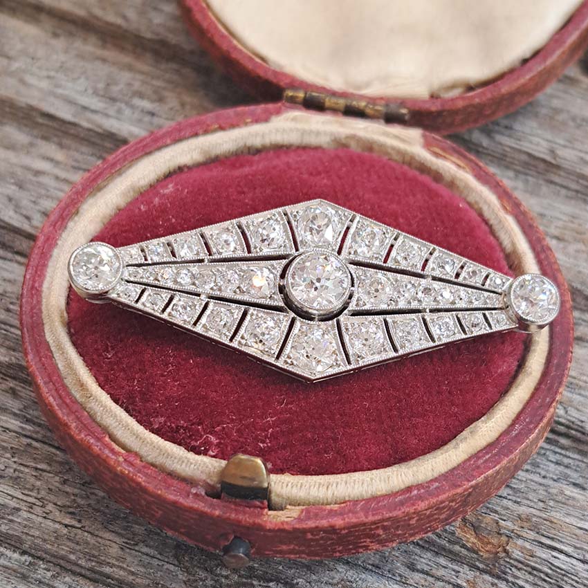 Art Deco French 4.67ct Old Cut Diamond Navette Brooch in Platinum, openwork lozenge shaped design with old European transitional cut diamonds, Circa 1920