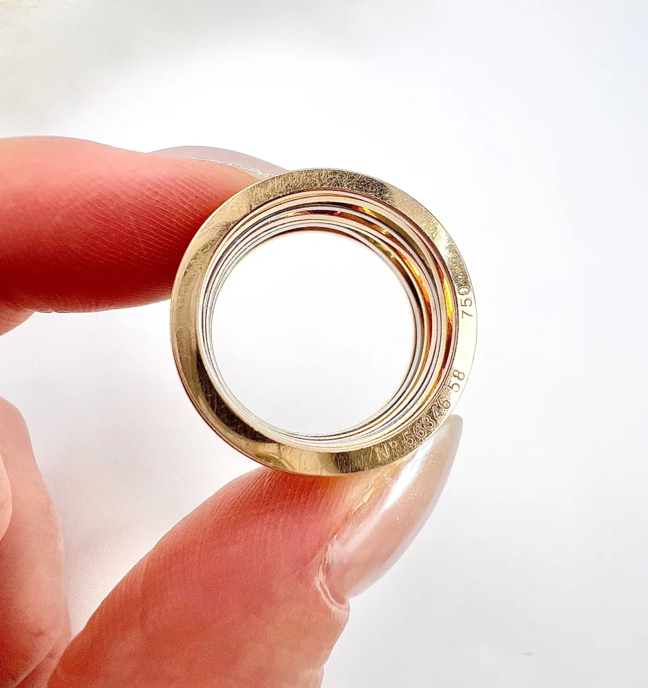 Omega Ladymatic ring in three colour gold.