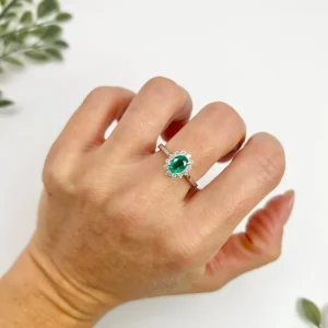 Emerald and diamond ring in white gold.