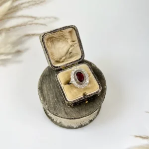 Antique tourmaline and diamond cluster ring in platinum.