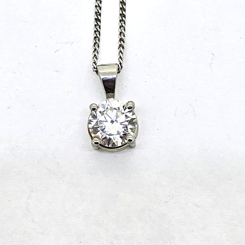 1ct Diamond Single Stone Solitaire Pendant, 1.01ct round brilliant-cut diamond four-claw set and mounted in platinum on 18ct inch chain