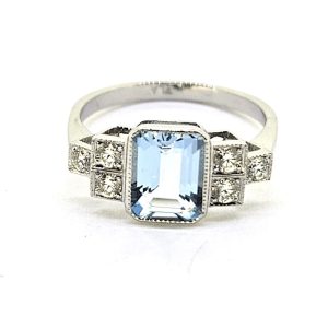 1.50ct Aquamarine and Diamond Engagement Ring in Platinum, 1.50 carat emerald-cut aquamarine flanked by brilliant-cut diamond set stepped shoulders
