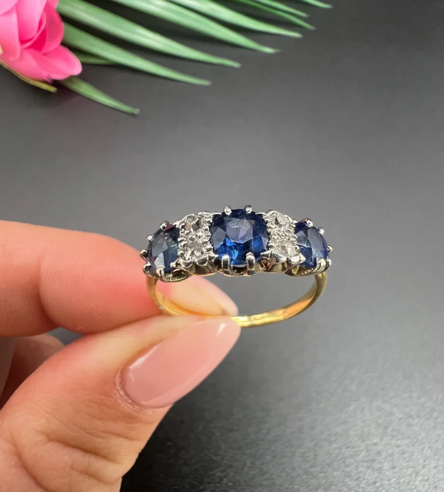Antique sapphire and diamond ring in gold and platinum..