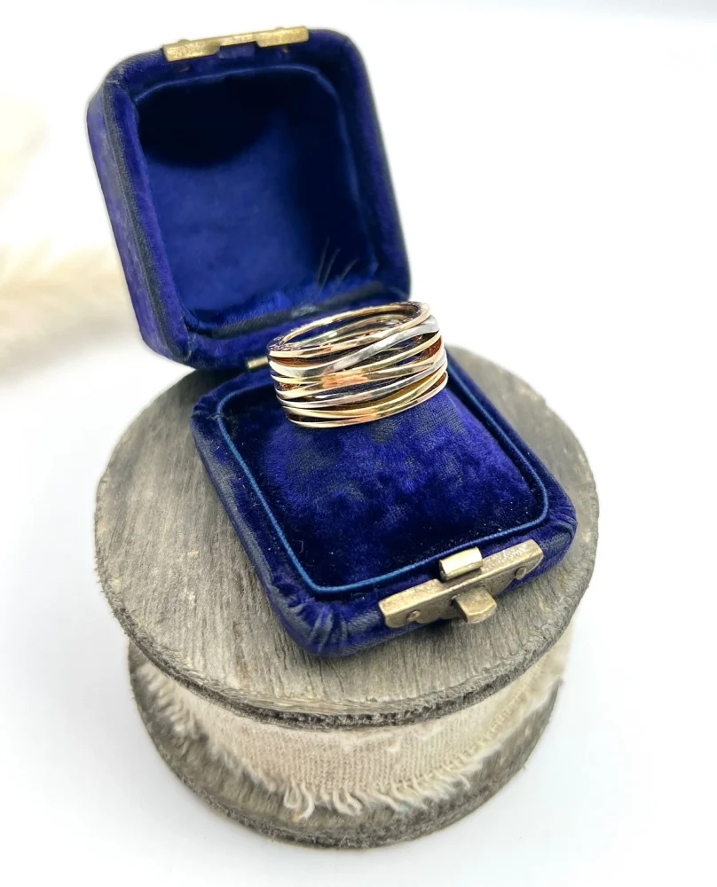 Omega Ladymatic ring in three colour gold.