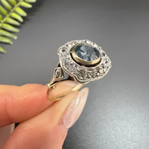 Antique aquamarine and diamond ring in gold and platinum.