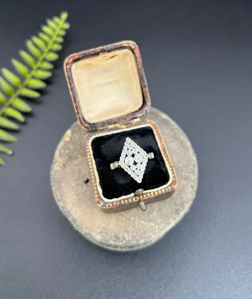 Antique diamond ring in gold and platinum.