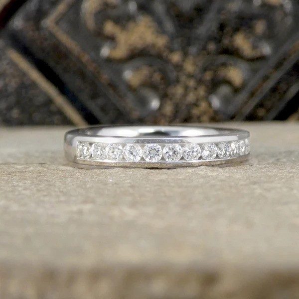 New diamond half eternity ring in platinum.